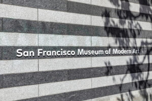 A close up of a sign on the side of a building that says "san francisco museum of modern art". Learn more about local landmarks and how a culturally sensitive therapist in San Francisco, CA can offer support with addressing mental health services. Contact a Filipino therapist in San Fransisco, CA today. 