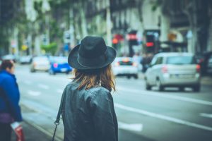 bigstock-Woman-In-City-Street-Traffic-317230192-1